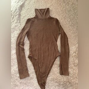 Brown turtle body suit sweater